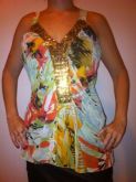 Blusa estampada em detalhe em paetê dourado tamanho M